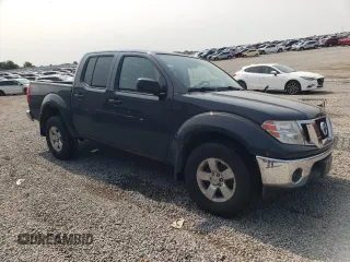 2010 Nissan Frontier LE with VIN 1N6AD0EV3AC407062, listed as a Copart auction lot 60444785 with 96,631 mi miles and Salvage title. Bid and sale history available at DreamBid. Image 4.