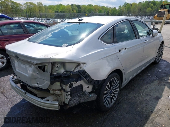 2017 Ford Fusion Titanium with VIN 3FA6P0K90HR266556, listed as a IAAI auction lot 41947924 with 135,628 mi miles. Bid and sale history available at carsss.com. Image 4.