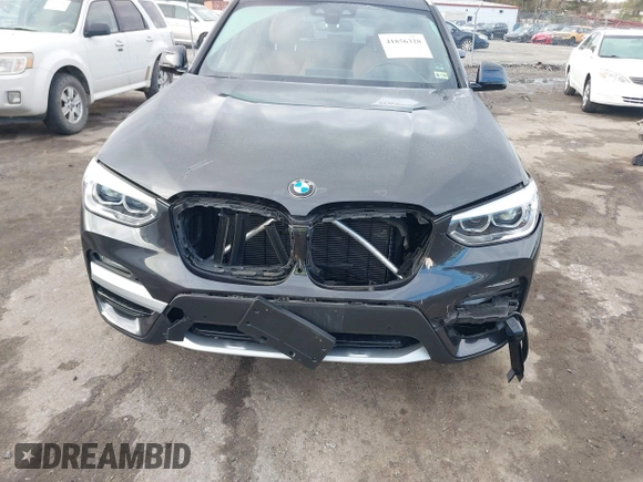 2021 BMW X3 xDrive30i with VIN 5UXTY5C03M9H92100, listed as a IAAI auction lot 41856328 with 19,460 mi miles and . Bid and sale history available at DreamBid. Image 6.