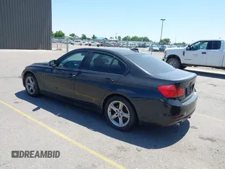 2014 BMW 3 Series 328d xDrive with VIN WBA3D5C55EKX96307, listed as a IAAI auction lot 42533740 with 169,229 mi miles and . Bid and sale history available at DreamBid. Image 3.