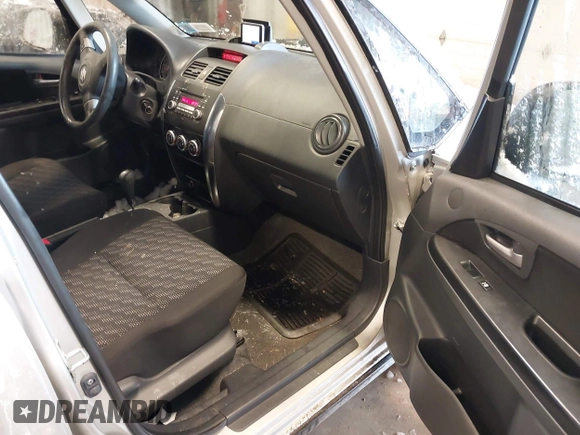 2009 Suzuki SX4 Man Touring Pkg AWD with VIN JS2YB417X95100192, listed as a IAAI auction lot 41618761 with 172,687 mi miles. Bid and sale history available at carsss.com. Image 5.