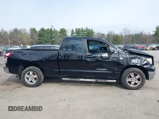 2007 Toyota Tundra SR5 z VIN 5TFBT54117X005726, wystawiony jako IAAI lot #42105716 z przebiegiem 84 828 mil mil oraz . Historia ofert i sprzedaży dostępna na DreamBid. Obrazek 13.