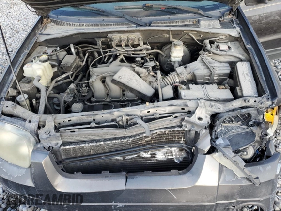 2006 Ford Escape XLT с VIN 1FMYU03186KB35165, выставлен на аукционе Copart как лот 71563254 с пробегом 206 450 миль миль и Чистый • Clean title. История ставок и продаж доступна на DreamBid. Изображение 12.