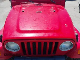 2005 Jeep Wrangler SE with VIN 1J4FA29S45P311320, listed as a IAAI auction lot 42095396 with 93,808 mi miles. Bid and sale history available at carsss.com. Image 6.