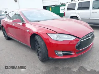 2013 Tesla Model S with VIN 5YJSA1CG0DFP14545, listed as a IAAI auction lot 41806844 with Not Provided miles. Bid and sale history available at carsss.com. Image 1.
