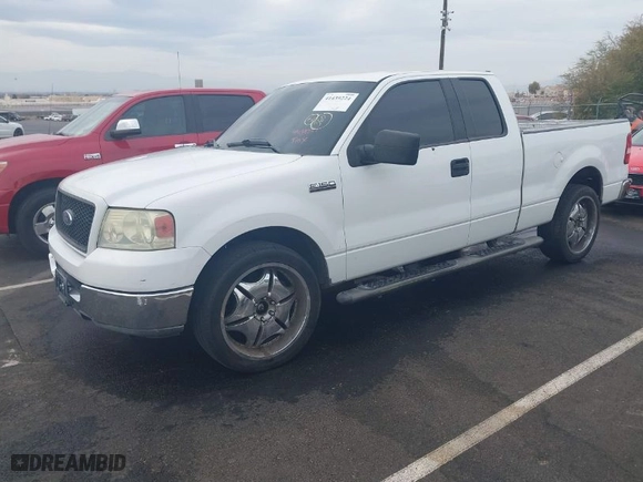 2004 Ford F-150 XL with VIN 1FTPX12574NB21111, listed as a IAAI auction lot 41439224 with 212,887 mi miles. Bid and sale history available at carsss.com. Image 2.