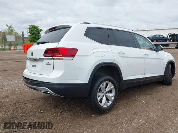 2019 Volkswagen Atlas SE with VIN 1V2UR2CA0KC560799, listed as a IAAI auction lot 42318671 with 95,804 mi miles and . Bid and sale history available at DreamBid. Image 4.