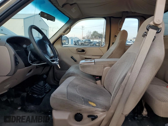 1999 Ford F-150 z VIN 2FTRX18W3XCA06671, wystawiony jako Copart lot #85561784 z przebiegiem 100 579 mil mil oraz Szkoda całkowita • Salvage title. Historia ofert i sprzedaży dostępna na DreamBid. Obrazek 7.