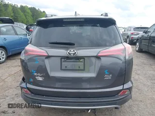 2018 Toyota RAV4 XLE with VIN JTMRFREV2JJ730874, listed as a IAAI auction lot 41980075 with 60,268 mi miles. Bid and sale history available at carsss.com. Image 17.