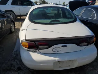 1996 Ford Taurus GL with VIN 1FALP52U6TA175539, listed as a Copart auction lot 73969534 with 118,371 mi miles and Salvage Title. Bid and sale history available at carsss.com. Image 6.