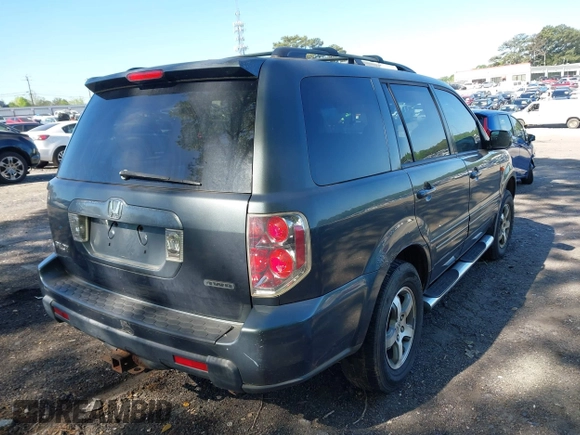 2006 Honda Pilot EX-L with VIN 2HKYF18586H556169, listed as a IAAI auction lot 42031231 with 260,963 mi miles and . Bid and sale history available at DreamBid. Image 4.