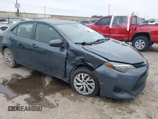 2018 Toyota Corolla L z VIN 5YFBURHE8JP762341, wystawiony jako IAAI lot #41616281 z przebiegiem 141 882 mil mil oraz . Historia ofert i sprzedaży dostępna na DreamBid. Obrazek 1.