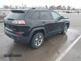2019 Jeep Cherokee Trailhawk Elite with VIN 1C4PJMBX6KD418409, listed as a IAAI auction lot 41178690 with 80,755 mi miles. Bid and sale history available at carsss.com. Image 4.