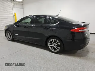2017 Ford Fusion Hybrid SE with VIN 3FA6P0LU9HR216757, listed as a Copart auction lot 64430315 with 106,247 mi miles and Clean title. Bid and sale history available at DreamBid. Image 2.