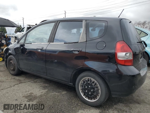 2007 Honda Fit z VIN JHMGD38457S012962, wystawiony jako Copart lot #55927755 z przebiegiem 172 153 mil mil oraz Szkoda całkowita • Salvage title. Historia ofert i sprzedaży dostępna na DreamBid. Obrazek 2.