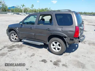 2006 Mazda Tribute i with VIN 4F2YZ02Z36KM29148, listed as a IAAI auction lot 42044163 with 175,786 mi miles and . Bid and sale history available at carsss.com. Image 3.