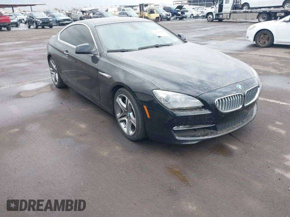 2012 BMW 6 Series 650i with VIN WBALX3C57CDV77359, listed as a IAAI auction lot 41443966 with 64,500 mi miles. Bid and sale history available at carsss.com. Image 1.