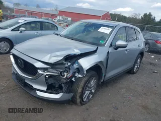 2021 Mazda CX-5 Grand Touring with VIN JM3KFBDM3M0354348, listed as a IAAI auction lot 41924207 with 45,786 mi miles. Bid and sale history available at carsss.com. Image 17.