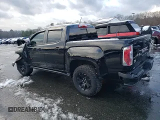 2022 GMC Canyon 4WD AT4 w/Leather with VIN 1GTG6FEN0N1297924, listed as a Copart auction lot 83185054 with 0 mi miles and Salvage Title. Bid and sale history available at carsss.com. Image 2.