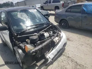 2010 Smart fortwo Pure z VIN WMEEJ3BA4AK342214, wystawiony jako Copart lot #62726614 z przebiegiem 110 472 mil mil oraz Szkoda całkowita • Salvage title. Historia ofert i sprzedaży dostępna na DreamBid. Obrazek 11.