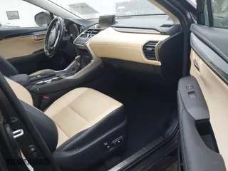 2015 Lexus NX 300h with VIN JTJYWRBZXF2008134, listed as a IAAI auction lot 41407931 with 104,095 mi miles. Bid and sale history available at carsss.com. Image 5.
