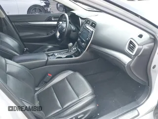 2016 Nissan Maxima SV with VIN 1N4AA6AP6GC416407, listed as a IAAI auction lot 41227003 with 125,781 mi miles and . Bid and sale history available at DreamBid. Image 5.