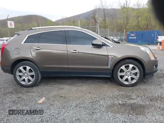 2014 Cadillac SRX Performance Collection with VIN 3GYFNCE33ES570472, listed as a IAAI auction lot 41971511 with 200,811 mi miles. Bid and sale history available at carsss.com. Image 13.