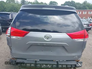 2013 Toyota Sienna LE with VIN 5TDJK3DC9DS054310, listed as a IAAI auction lot 42668103 with 209,712 mi miles and . Bid and sale history available at DreamBid. Image 16.