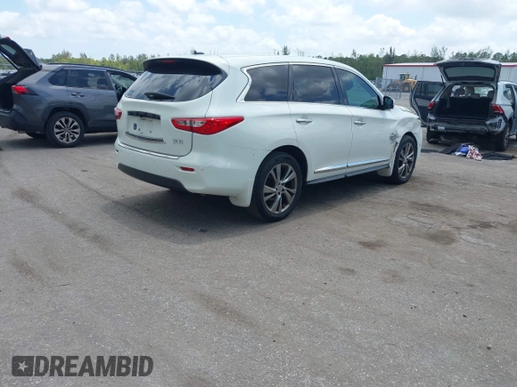 2013 Infiniti JX35 with VIN 5N1AL0MN3DC315618, listed as a IAAI auction lot 42107516 with 178,518 mi miles and . Bid and sale history available at DreamBid. Image 4.