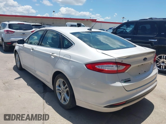 2016 Ford Fusion Titanium with VIN 3FA6P0SU5GR120687, listed as a IAAI auction lot 42571006 with 143,210 mi miles and . Bid and sale history available at DreamBid. Image 14.