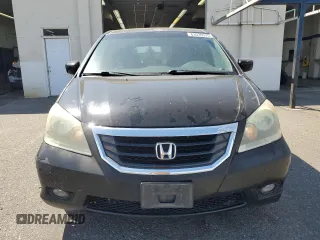 2010 Honda Odyssey Touring with VIN 5FNRL3H9XAB067890, listed as a Copart auction lot 63520575 with 213,582 mi miles and Clean title. Bid and sale history available at DreamBid. Image 5.