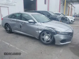2021 Honda Accord Touring with VIN 1HGCV3F99MA020450, listed as a IAAI auction lot 42194371 with 19,206 mi miles and . Bid and sale history available at DreamBid. Image 1.
