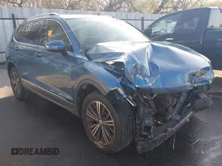 2018 Volkswagen Tiguan SEL z VIN 3VV2B7AX7JM036291, wystawiony jako IAAI lot #41964720 z przebiegiem Nie podano mil oraz . Historia ofert i sprzedaży dostępna na DreamBid. Obrazek 1.