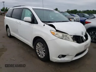 2011 Toyota Sienna XLE AAS with VIN 5TDYK3DCXBS063948, listed as a Copart auction lot 59776695 with 305,799 mi miles and Salvage title. Bid and sale history available at DreamBid. Image 4.