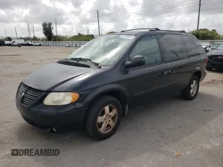 2005 Dodge Caravan SXT with VIN 2D4GP44L85R150184, listed as a Copart auction lot 44733004 with 124,039 mi miles and Salvage title. Bid and sale history available at DreamBid. Image 1.
