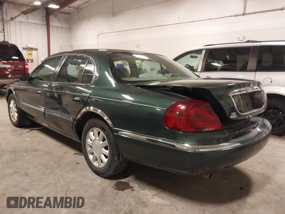2001 Lincoln Continental with VIN 1LNHM97V11Y691910, listed as a IAAI auction lot 41501779 with 102,715 mi miles and . Bid and sale history available at DreamBid. Image 3.