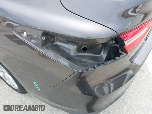 2019 Toyota Camry LE with VIN 4T1B11HKXKU818442, listed as a IAAI auction lot 41906128 with 30,728 mi miles and . Bid and sale history available at DreamBid. Image 6.