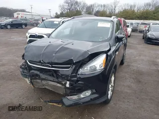 2016 Ford Escape Titanium with VIN 1FMCU0J91GUC69895, listed as a IAAI auction lot 41488171 with 162,232 mi miles. Bid and sale history available at carsss.com. Image 18.