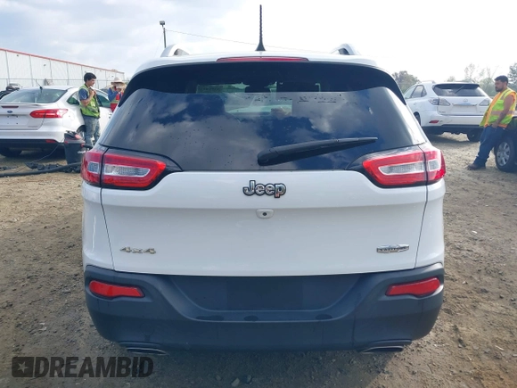 2016 Jeep Cherokee Latitude with VIN 1C4PJMCS5GW148829, listed as a IAAI auction lot 41964335 with 99,741 mi miles. Bid and sale history available at carsss.com. Image 16.