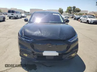 2022 Ford Mustang Mach-E Premium z VIN 3FMTK3R7XNMA24055, wystawiony jako Copart lot #62717525 z przebiegiem 25 079 mil mil oraz Szkoda całkowita • Salvage title. Historia ofert i sprzedaży dostępna na DreamBid. Obrazek 5.
