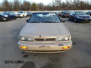 1990 Nissan Stanza GXE z VIN JN1FU21P9LX822087, wystawiony jako Copart lot #82967984 z przebiegiem 109 985 mil mil oraz Tytuł czysty. Historia ofert i sprzedaży dostępna na DreamBid. Obrazek 5.