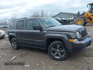 2015 Jeep Patriot High Altitude with VIN 1C4NJPFA2FD297575, listed as a IAAI auction lot 41848731 with 77,149 mi miles and . Bid and sale history available at DreamBid. Image 13.