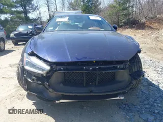2019 Maserati Ghibli S Q4 GranLusso z VIN ZAM57YTLXK1338200, wystawiony jako IAAI lot #41875692 z przebiegiem 31 254 mil mil oraz . Historia ofert i sprzedaży dostępna na DreamBid. Obrazek 13.