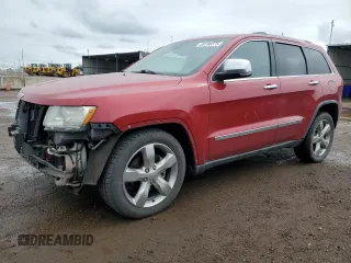 2011 Jeep Grand Cherokee Overland with VIN 1J4RR6GG3BC684380, listed as a Copart auction lot 59196575 with 128,407 mi miles and Salvage title. Bid and sale history available at DreamBid. Image 1.