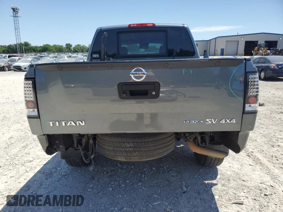 2015 Nissan Titan Pro-4X with VIN 1N6BA0EC5FN514184, listed as a Copart auction lot 56721065 with 127,283 mi miles and Salvage title. Bid and sale history available at DreamBid. Image 6.