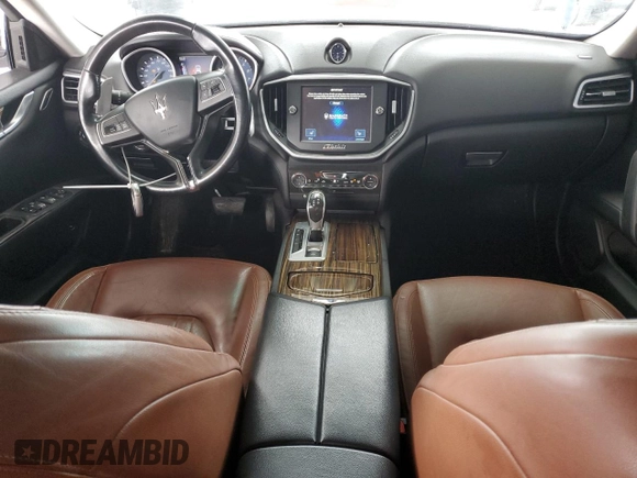 2015 Maserati Ghibli z VIN ZAM57XSA6F1158678, wystawiony jako Copart lot #86509984 z przebiegiem 87 021 mil mil oraz Czysty tytuł • Clean title. Historia ofert i sprzedaży dostępna na DreamBid. Obrazek 8.