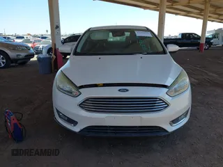 2015 Ford Focus Titanium with VIN 1FADP3J28FL256155, listed as a IAAI auction lot 42350610 with 53,840 mi miles and . Bid and sale history available at DreamBid. Image 6.