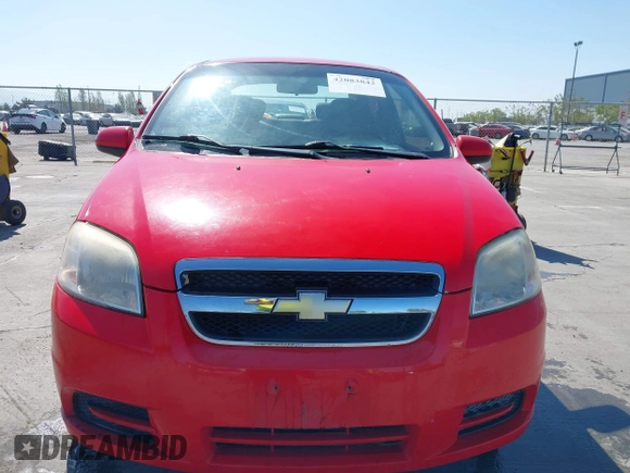 2011 Chevrolet Aveo 1LT z VIN KL1TD5DE0BB151956, wystawiony jako IAAI lot #42083842 z przebiegiem 115 607 mil mil oraz . Historia ofert i sprzedaży dostępna na DreamBid. Obrazek 12.