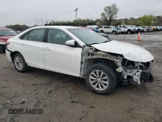 2015 Toyota Camry XLE with VIN 4T4BF1FK6FR511382, listed as a Copart auction lot 52029145 with 129,069 mi miles and Salvage Title. Bid and sale history available at carsss.com. Image 4.