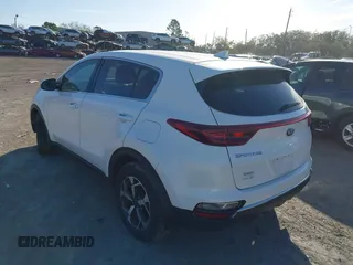 2021 Kia Sportage LX with VIN KNDPM3AC5M7907935, listed as a IAAI auction lot 41738513 with 79,116 mi miles. Bid and sale history available at carsss.com. Image 3.